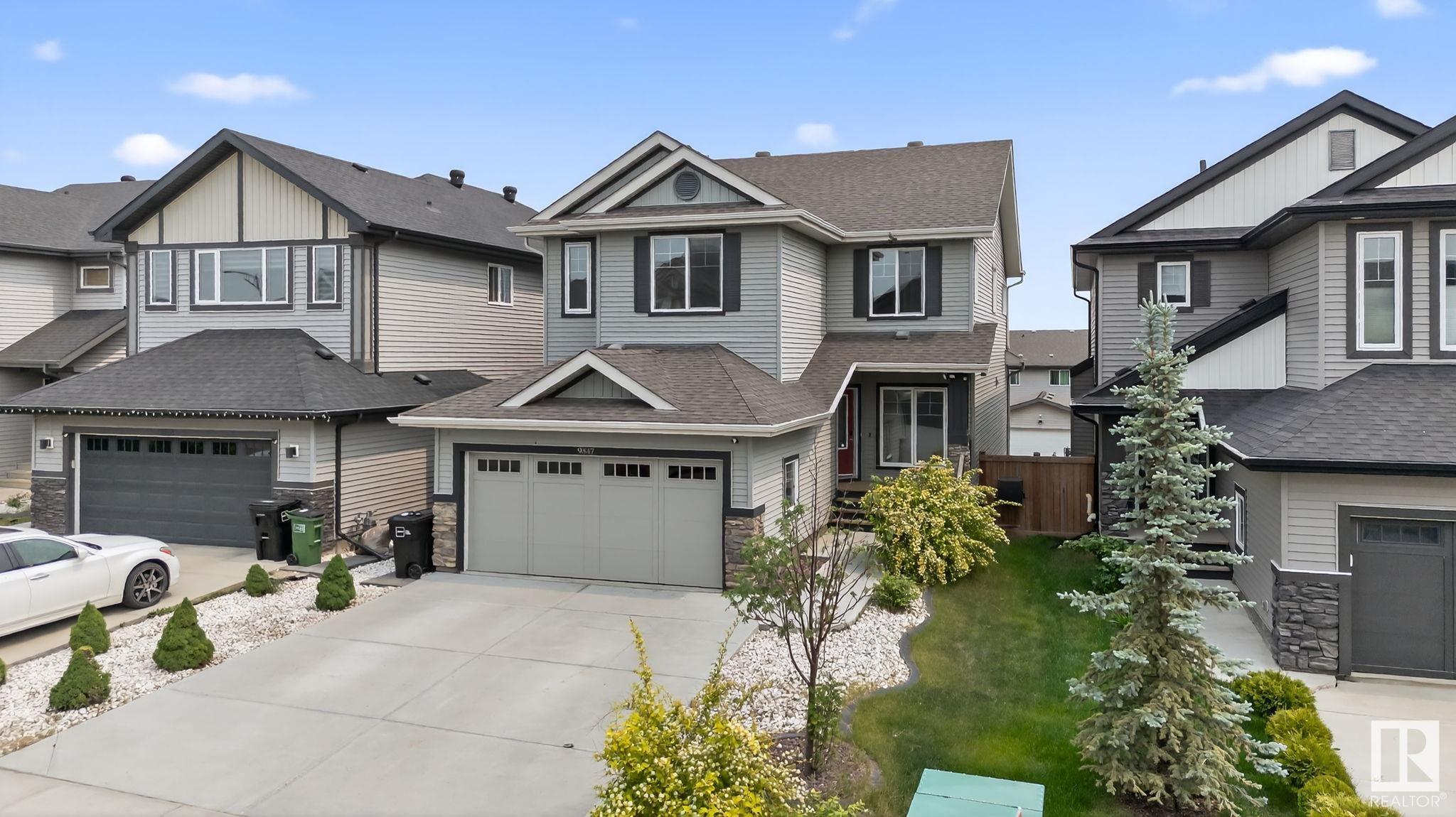 Property Photo: 9847 222 Street NW AB T5T 4P6