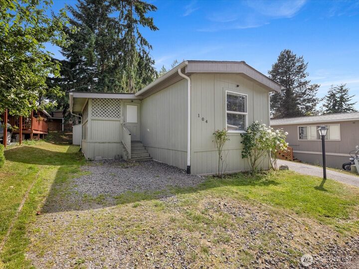 Property Photo:  7701  Hardeson Road 104  WA 98203 