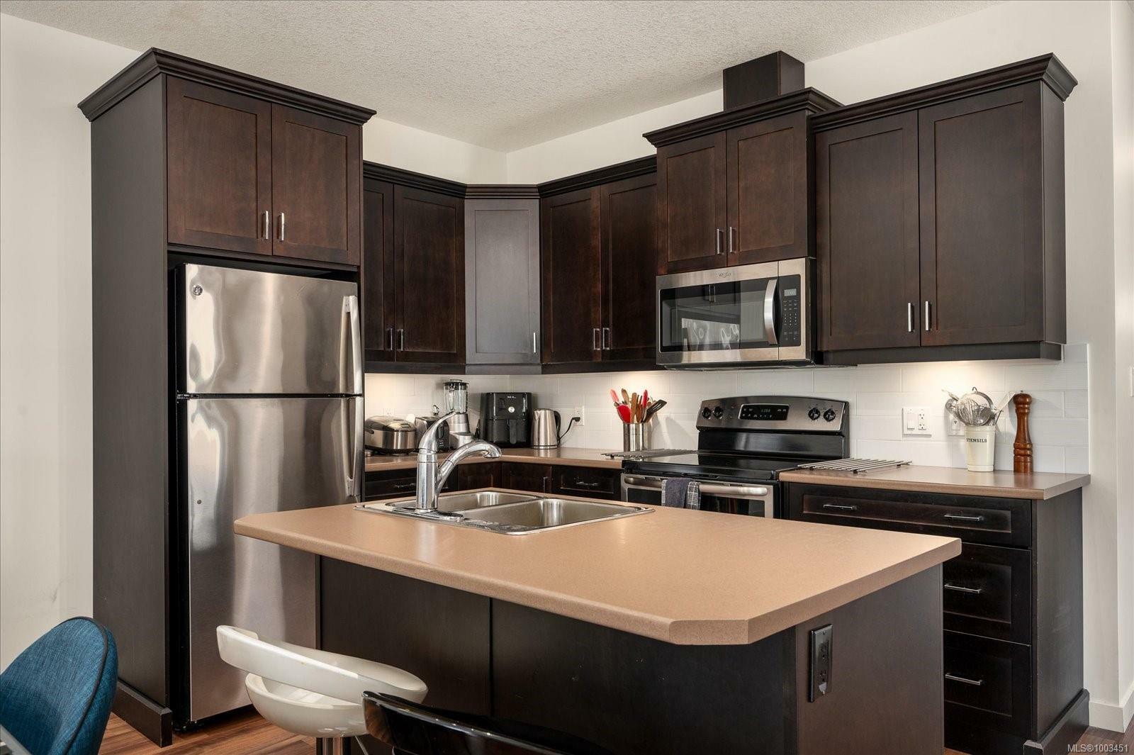 Property Photo: 1720 Dufferin Cres 211 BC V9S 0B9