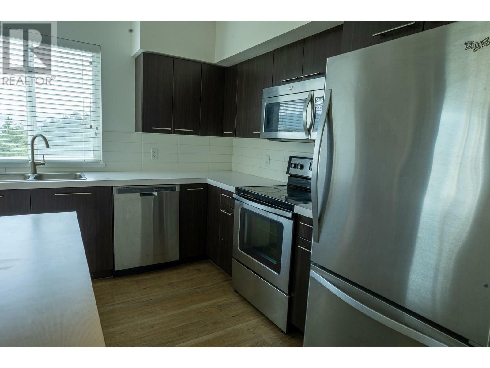 Property Photo: 985 Academy Way 307 BC V1V 3C8