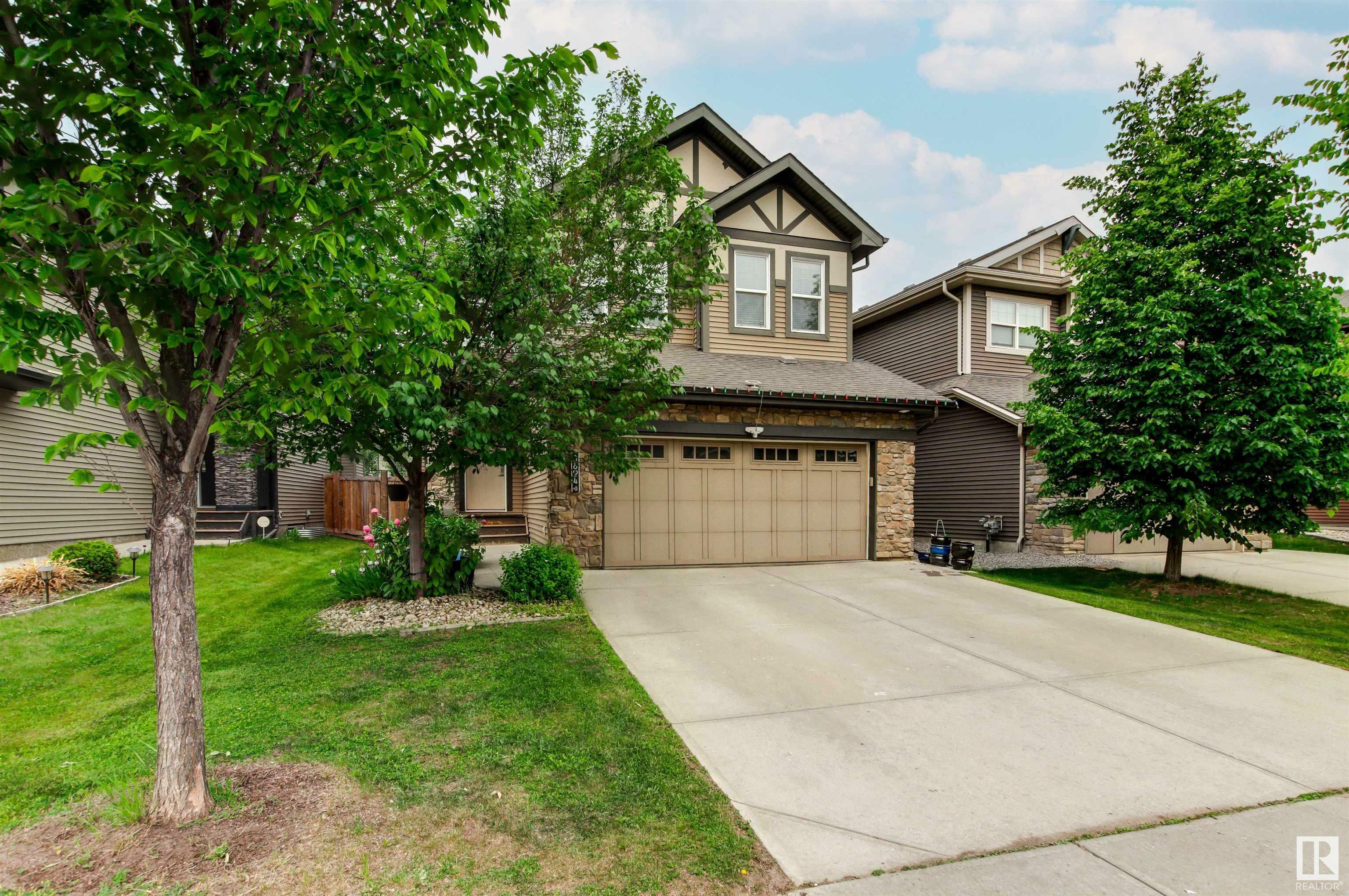 Property Photo: 8804 217 Street NW AB T5T 4R4
