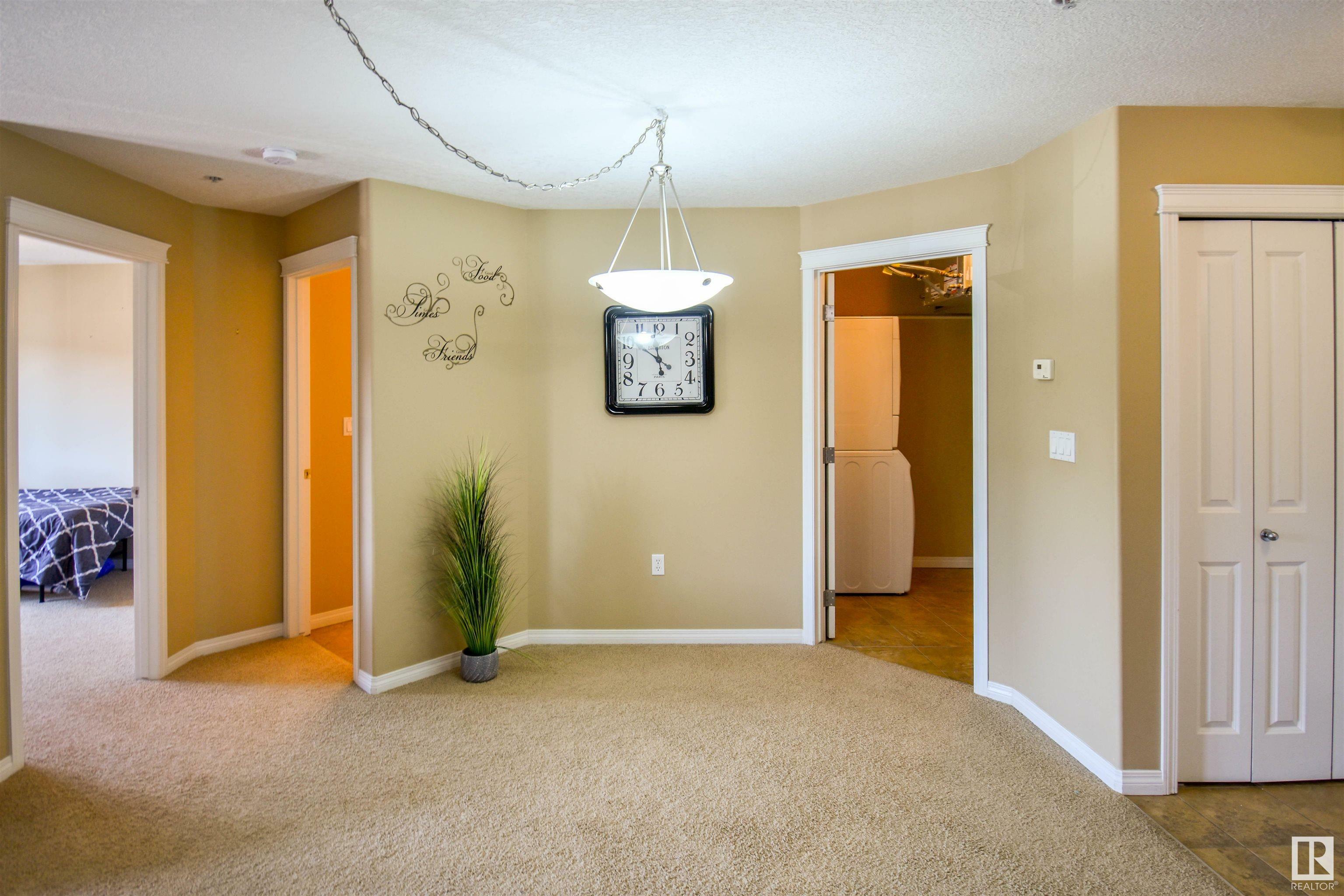 Property Photo: 300 Spruce Ridge Road 204 AB T7X 0H6