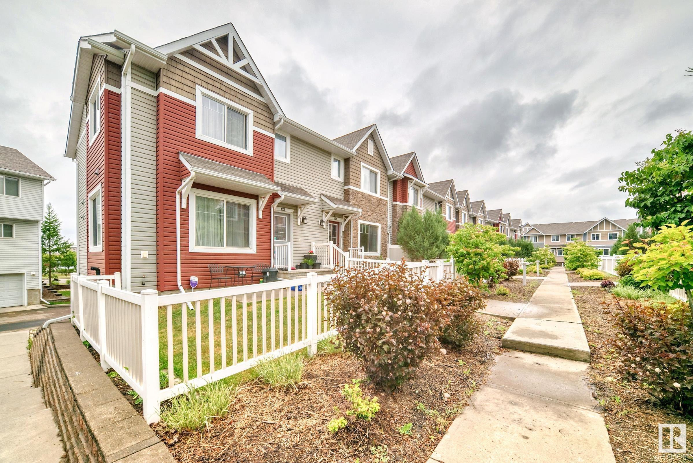 Property Photo: 655 Tamarack Road NW 120 AB T6T 0N4