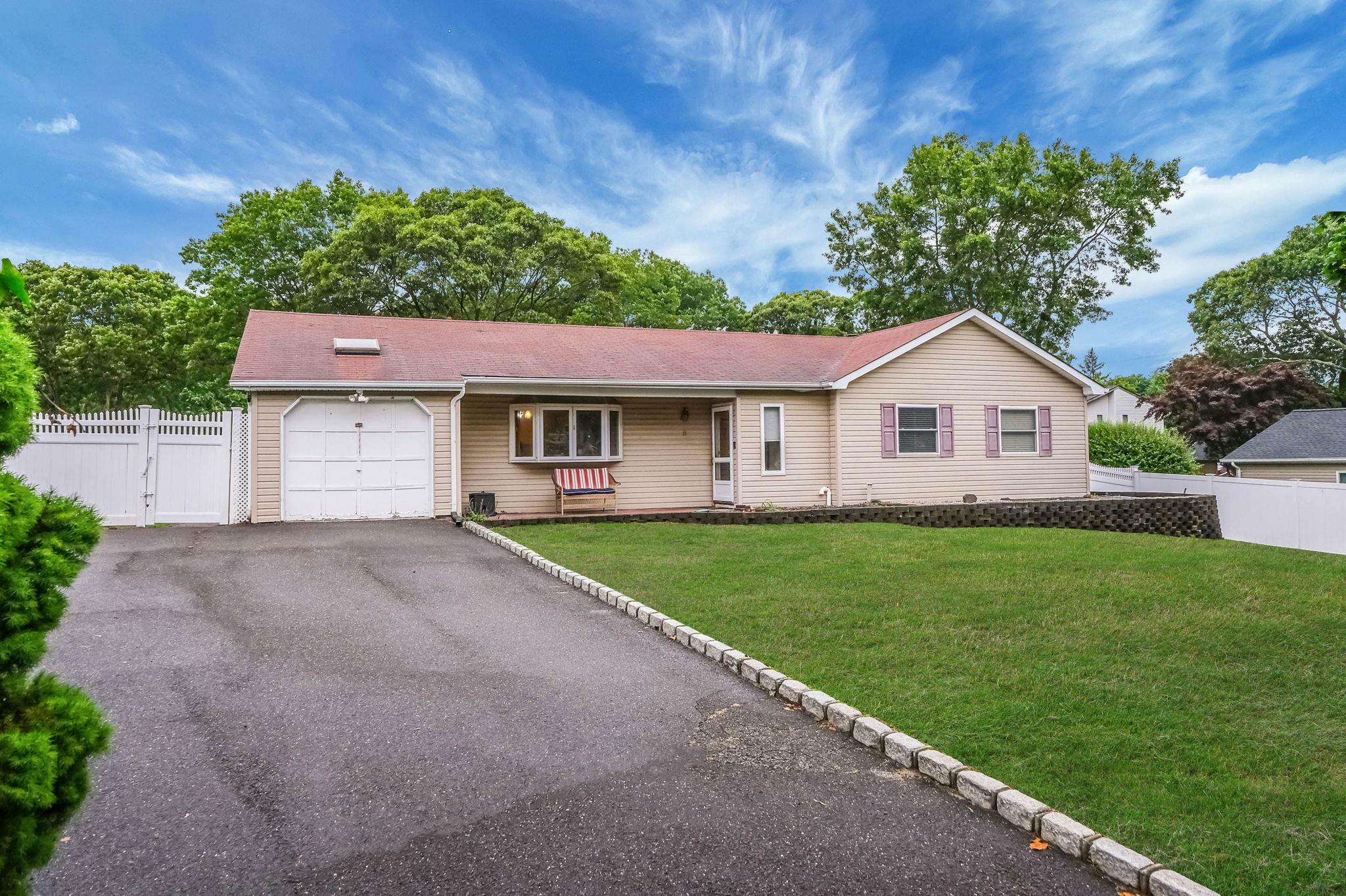 Property Photo: 8 Peconic Lane NY 11784