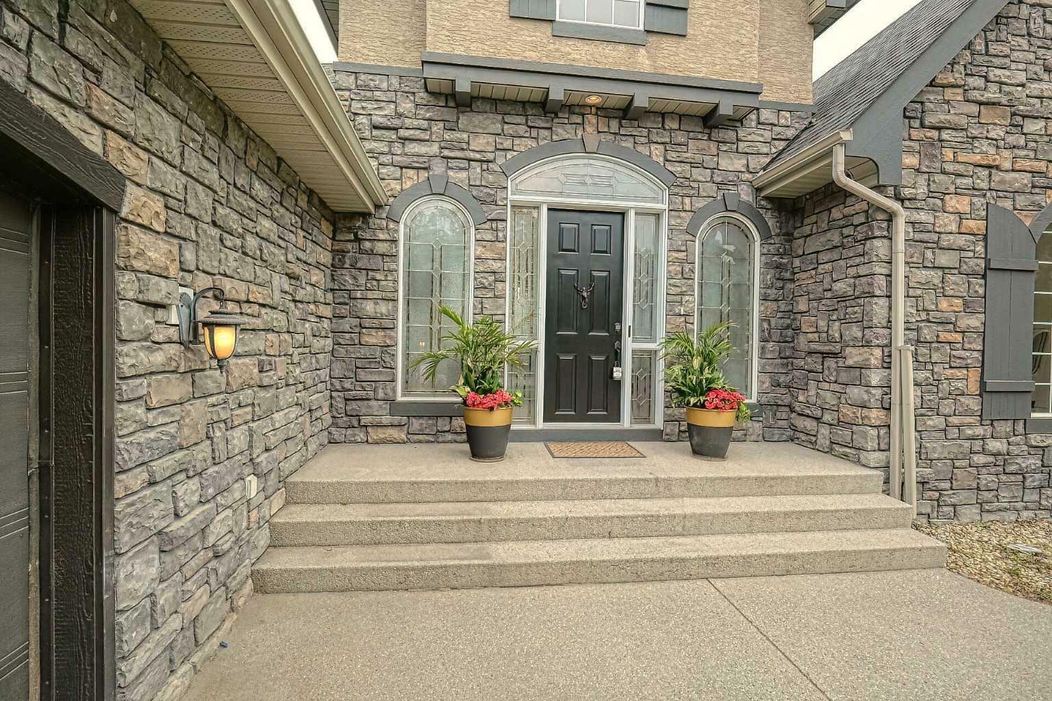 Property Photo: 239 Heritage Lake Drive AB T1S 4H9