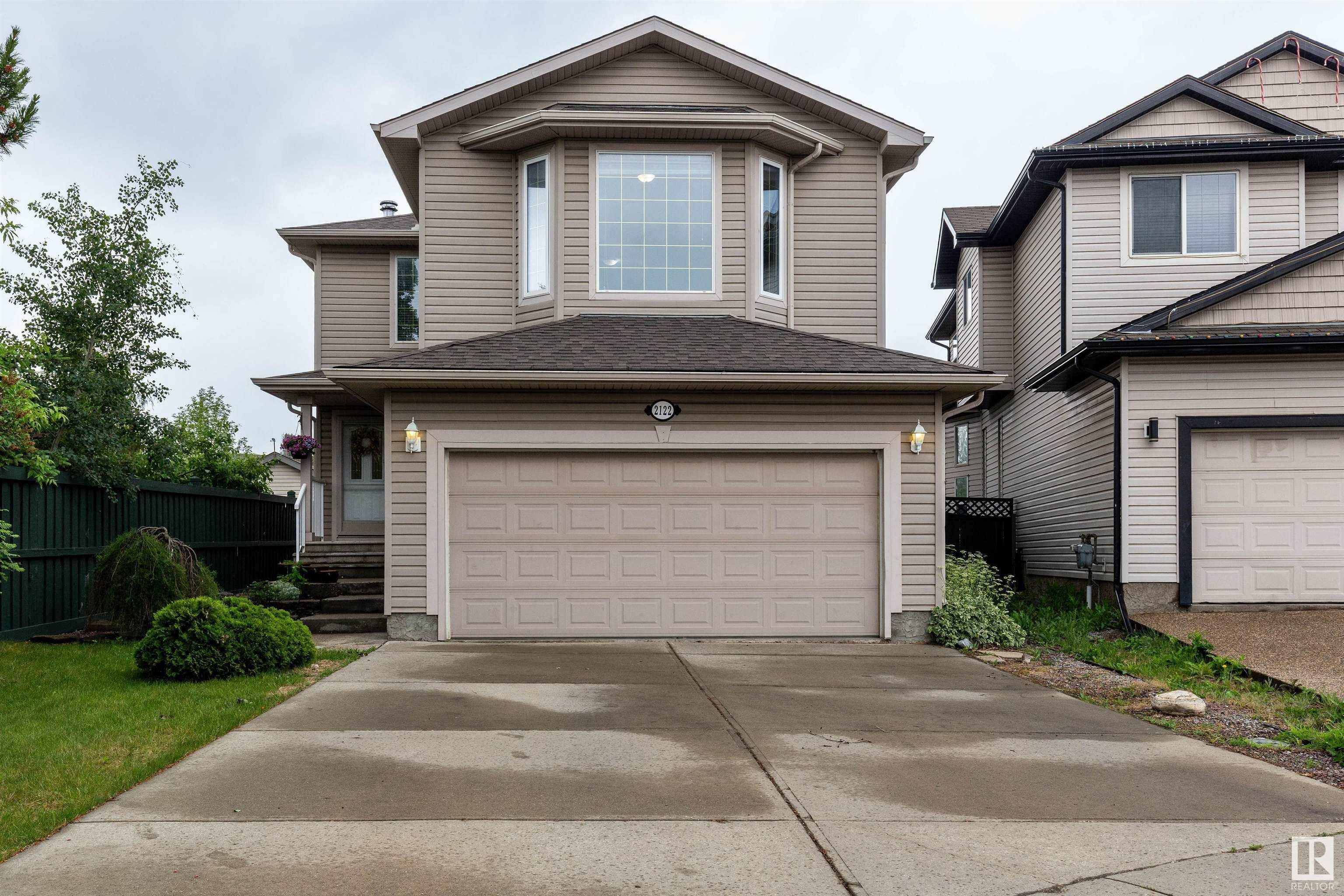 Property Photo: 2122 Garnett Place NW AB T5T 6R5