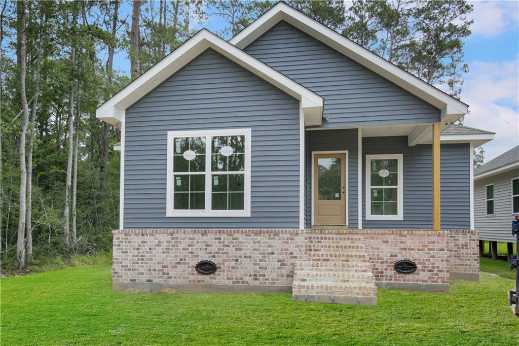 Property Photo:  60420 Aqua Street  LA 70445 