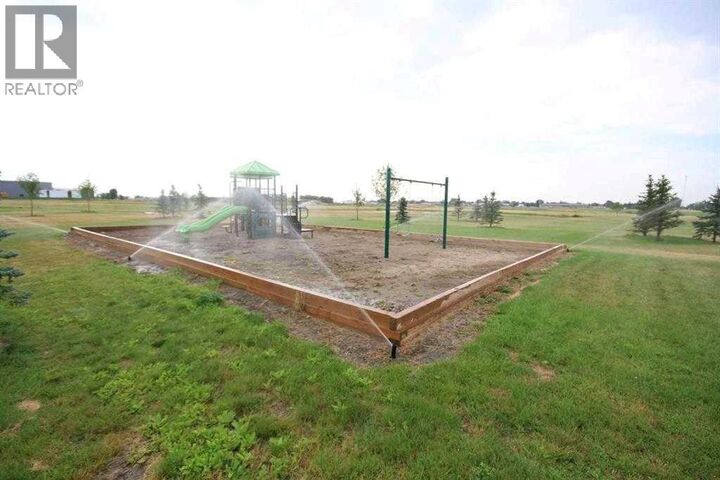 Property Photo:  5 Meadows Way  AB T1G 2A2 
