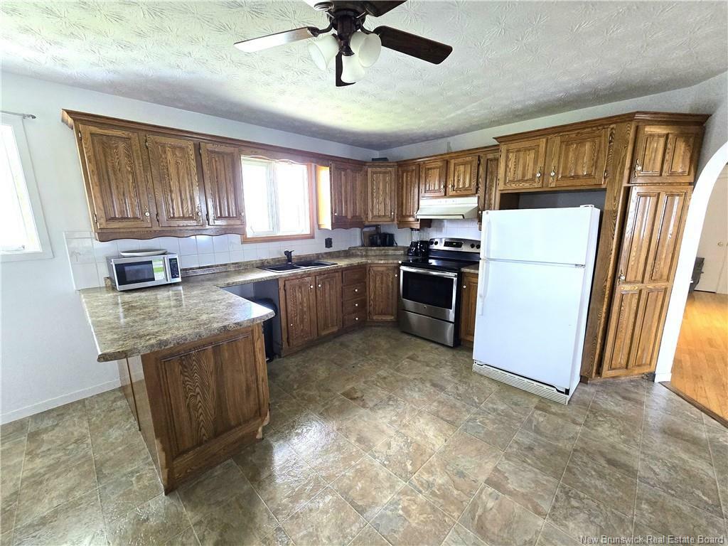 Property Photo:  56 32E Avenue  NB E3V 2S2 