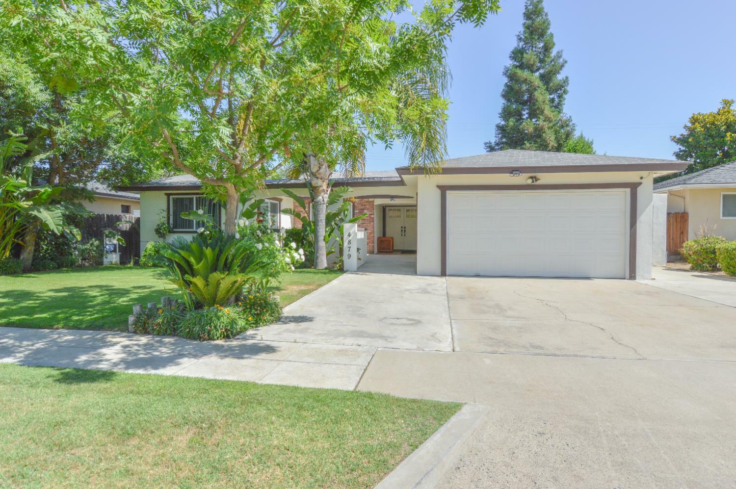 Property Photo:  4879 E San Gabriel Avenue  CA 93726 