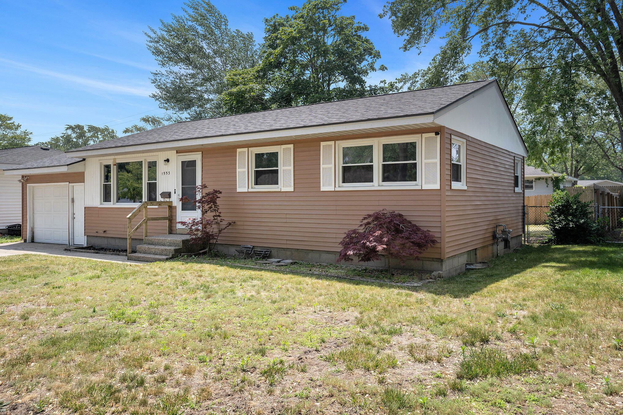 Property Photo: 1553 Greenwich Road MI 49441