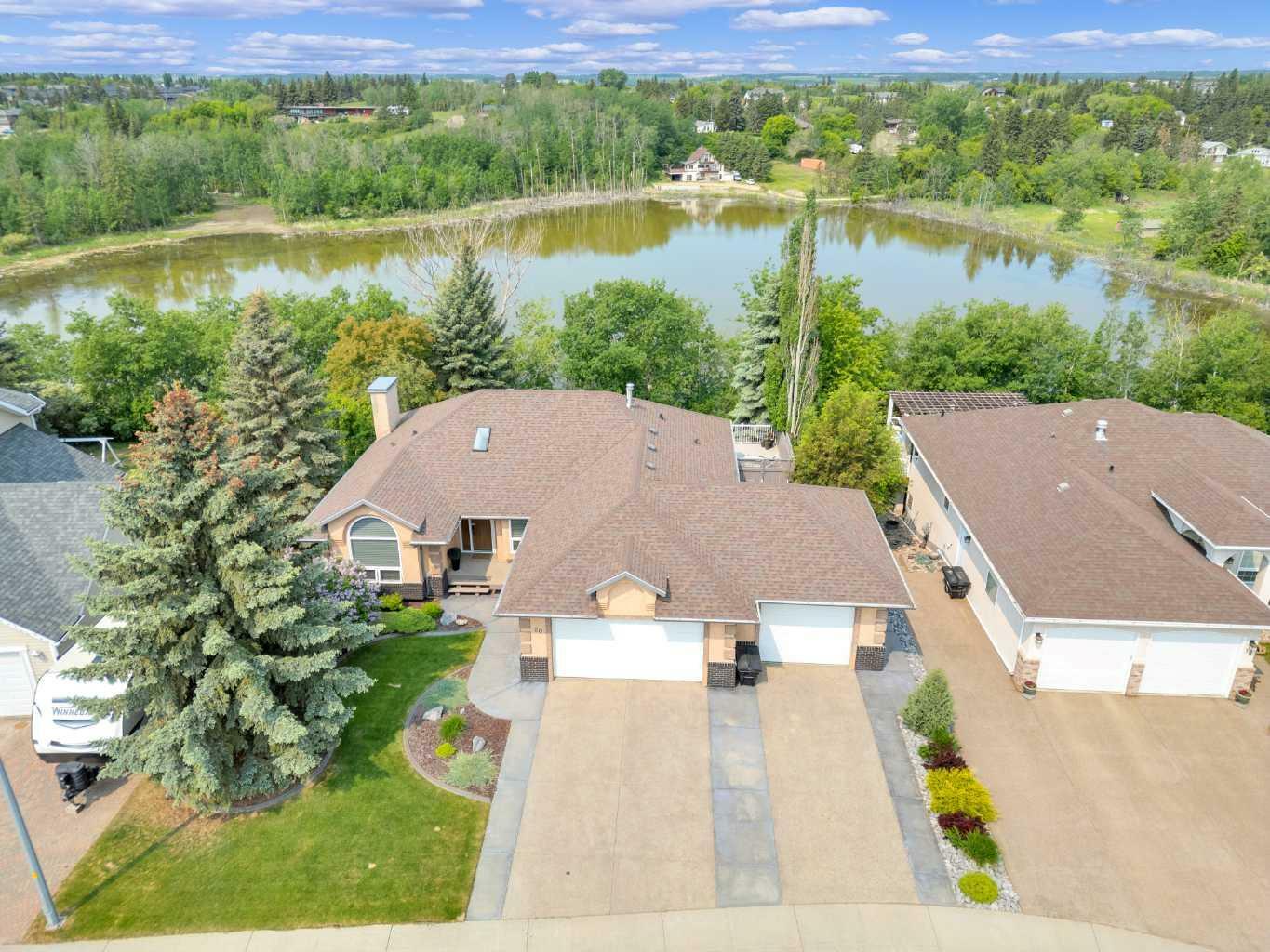 Property Photo: 20 Lakes Close AB T4L 1S4