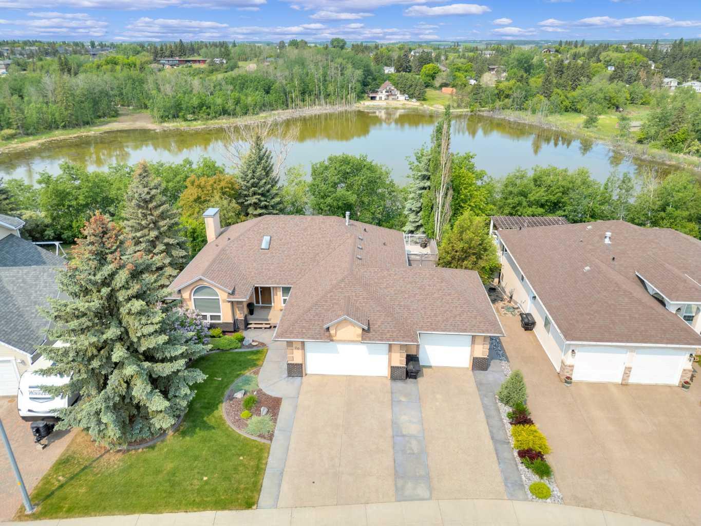 Property Photo: 20 Lakes Close AB T4L 1S4