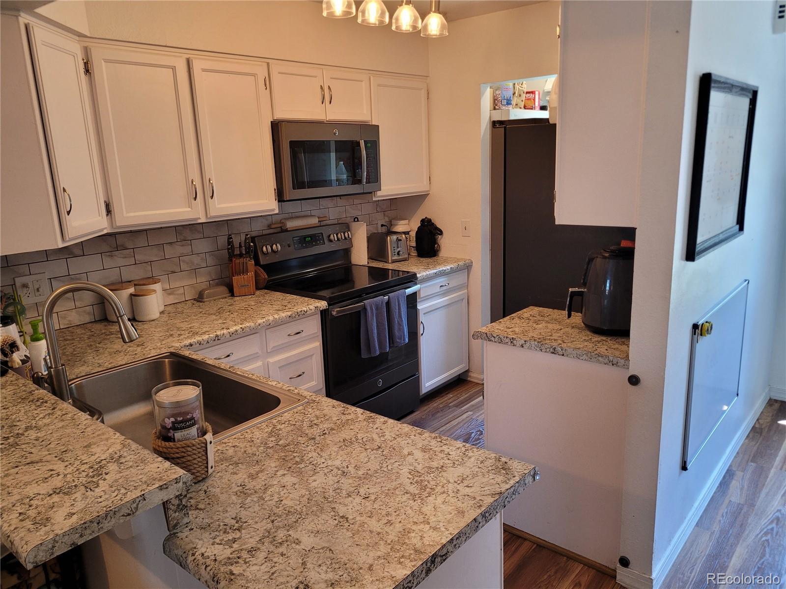 Property Photo: 15507 E Louisiana Avenue CO 80017