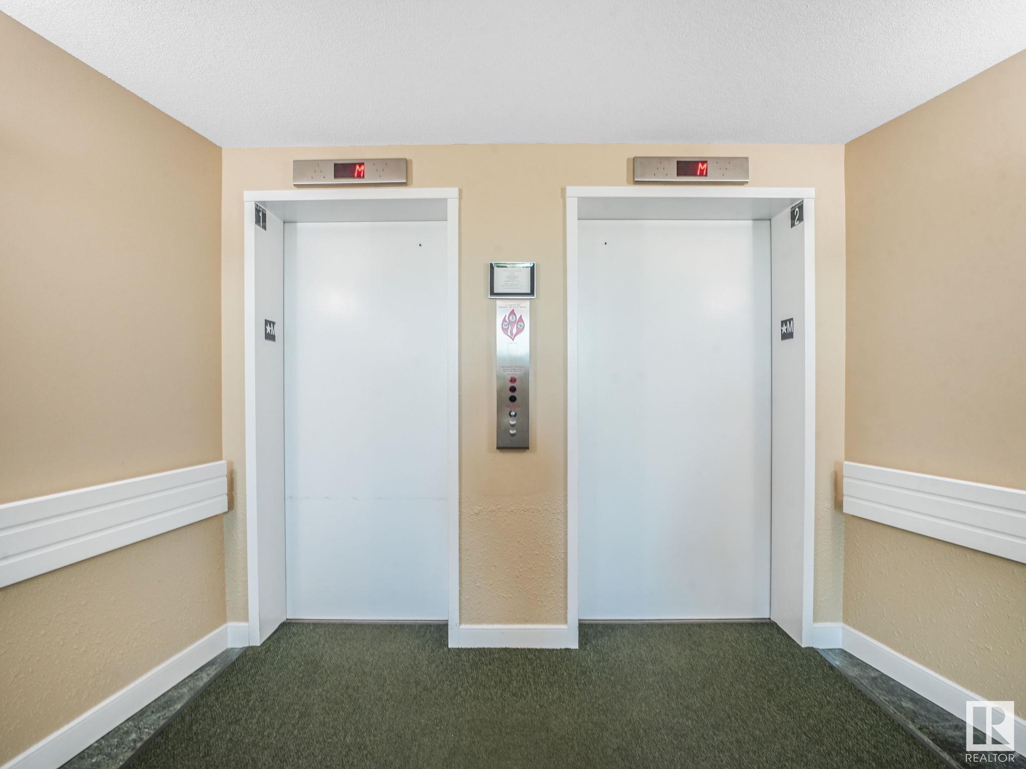 Property Photo:  6220 Fulton Road NW 211  AB T6A 3T4 