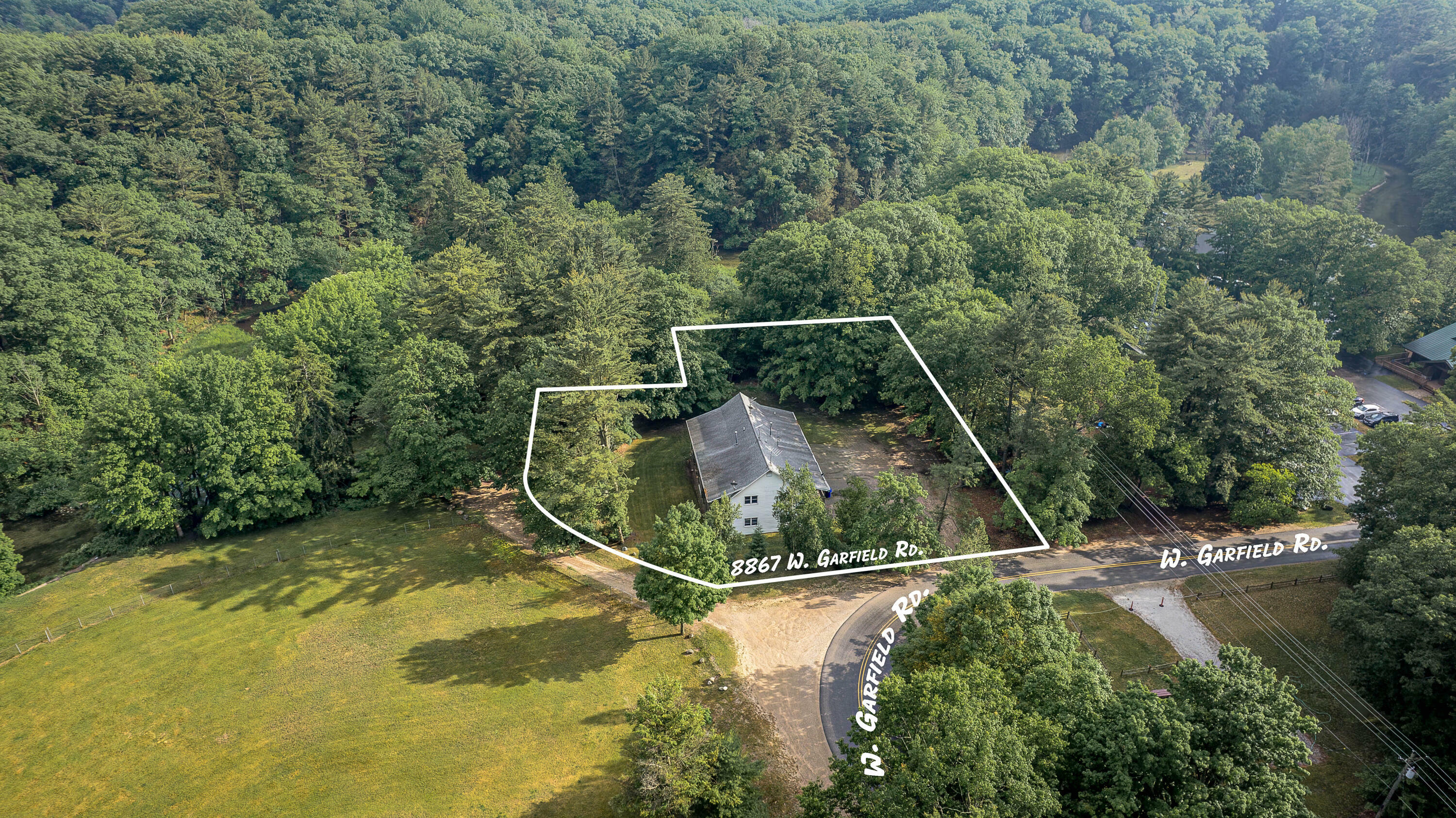 Property Photo:  8867 W Garfield Road  MI 49455 