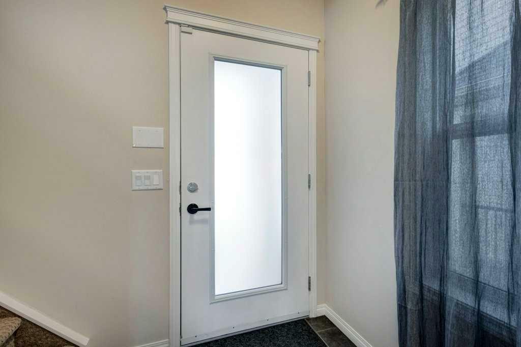 Property Photo: 129 Walden Crescent SE AB T2X 0T2