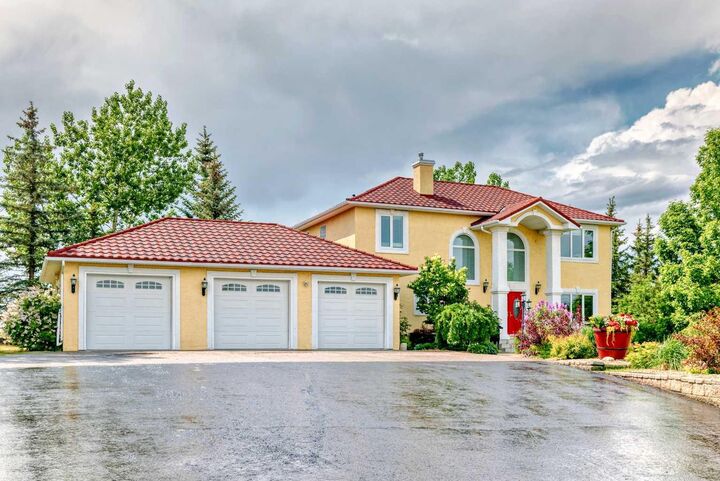 Property Photo:  226235 22 Street W  AB T1S 3N2