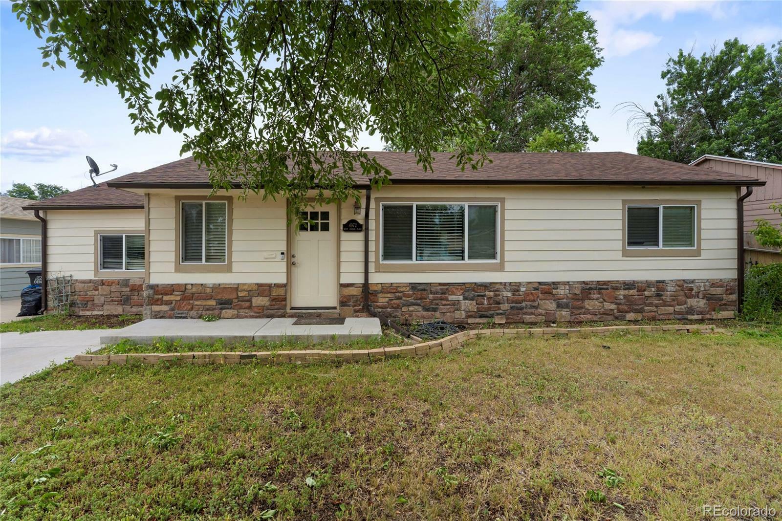 Property Photo: 4972 W Custer Place CO 80219