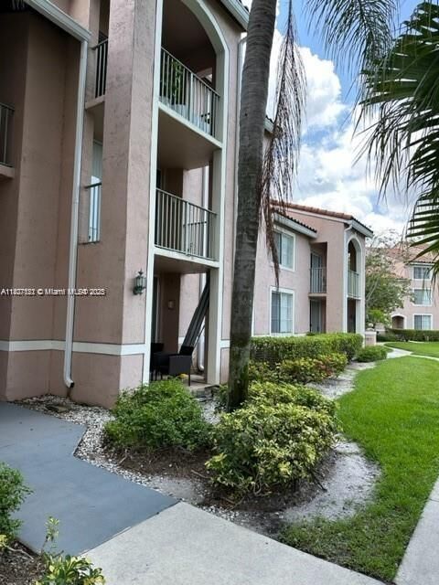 Property Photo:  12148 Saint Andrews Pl 104  FL 33025 