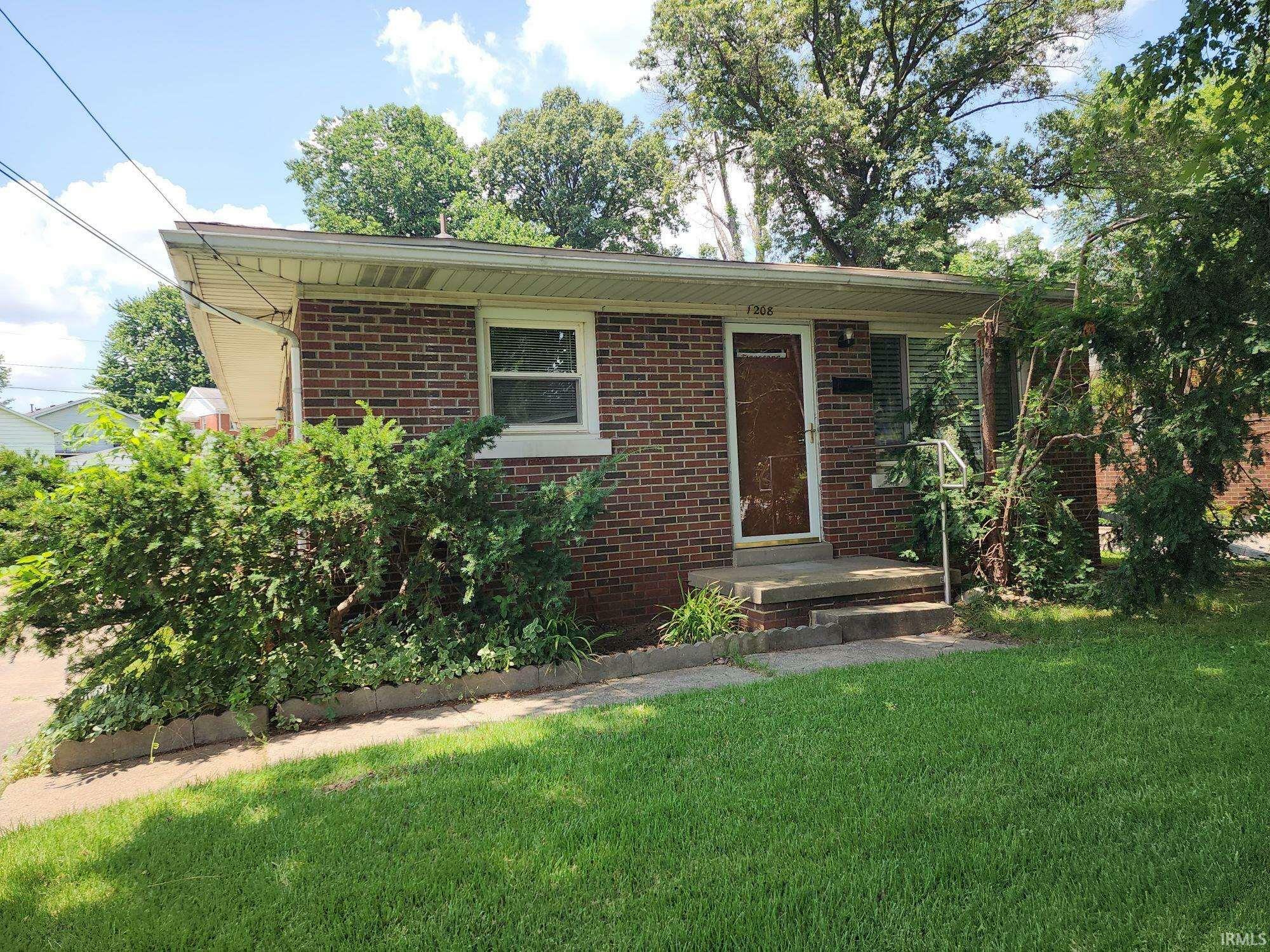 Property Photo: 1208 N Saint Joseph Avenue IN 47720