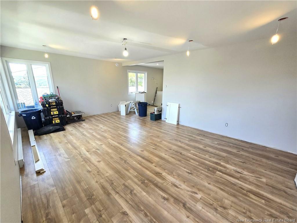 Property Photo:  18 23E Avenue  NB E3V 2G5 