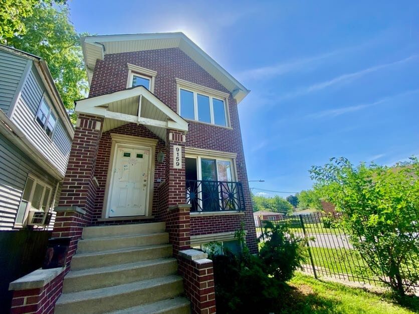 Property Photo:  9159 S Dobson Avenue  IL 60619 