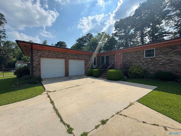 Property Photo:  201 Tuskegee Circle  AL 35903 