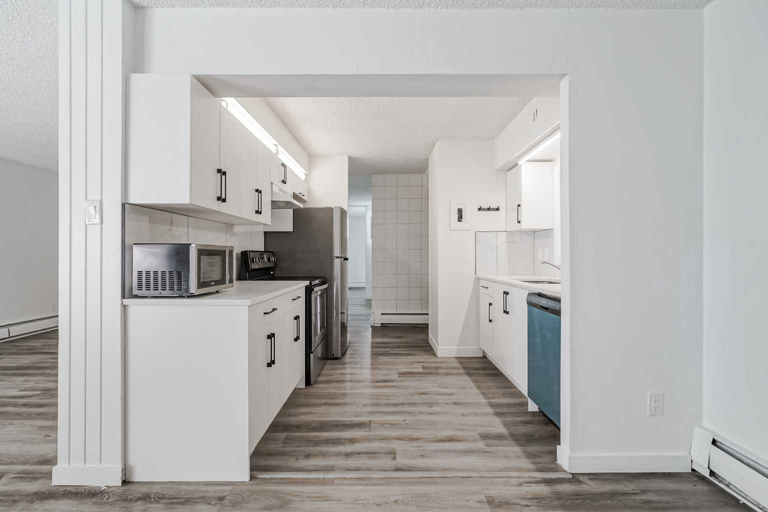 Property Photo: 6919 Elbow Drive SW 113 AB T2V 0E6