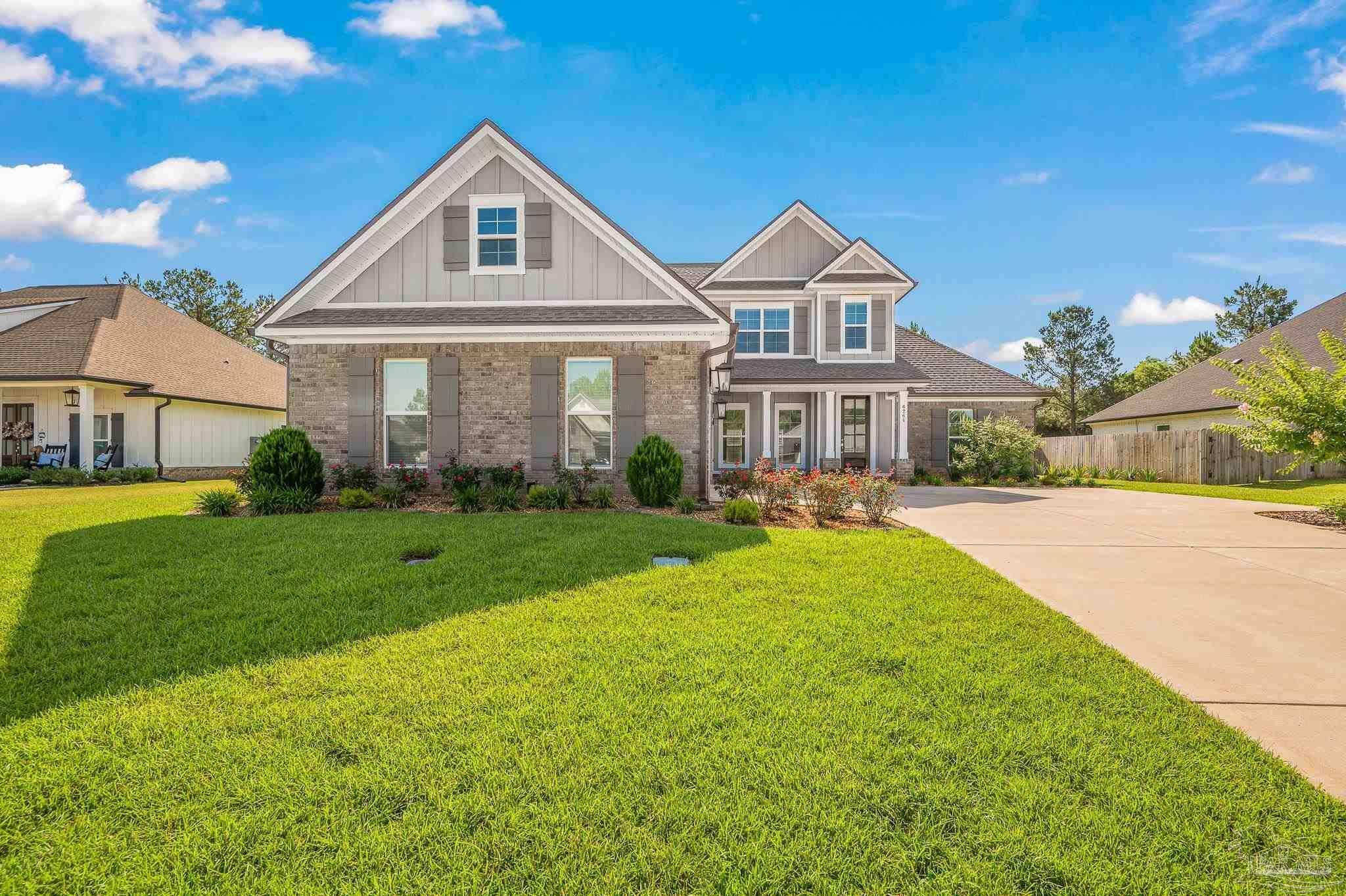 Property Photo:  6264 Howie Way  FL 32571 