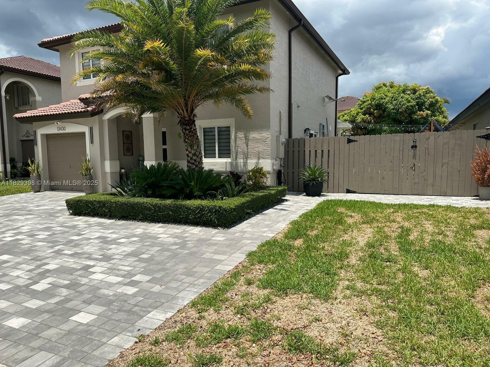 Property Photo: 13430 SW 118th Pl FL 33186
