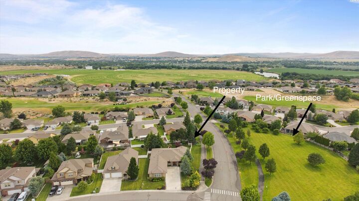 Property Photo:  2703 Sawgrass Loop  WA 99354 