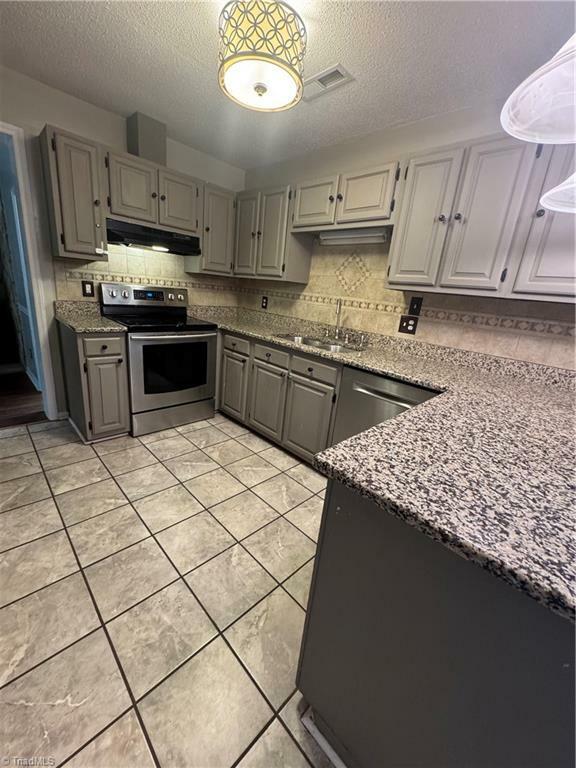 Property Photo: 420 Logan Court NC 27021