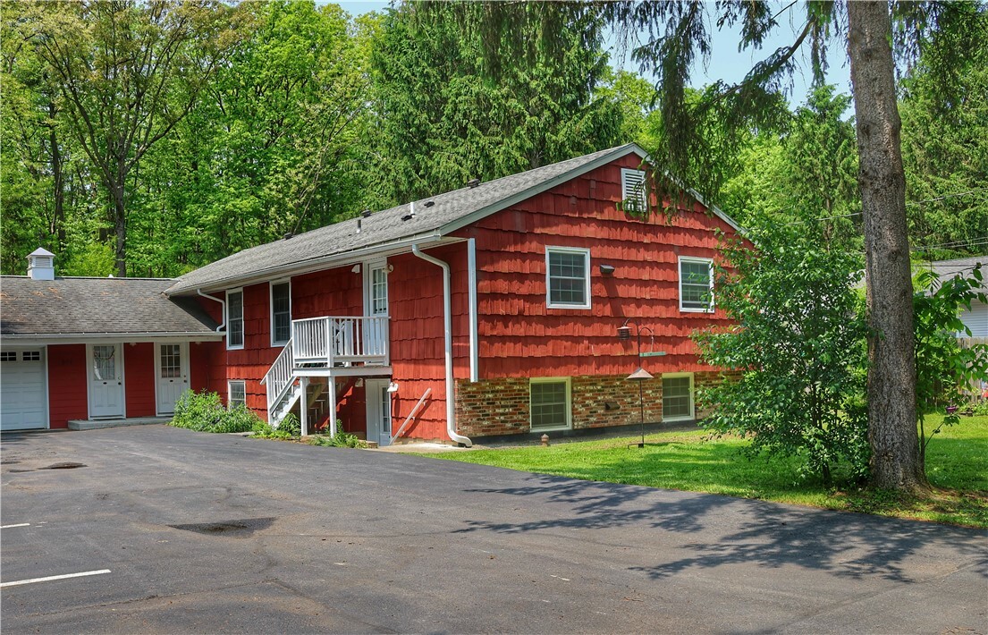 Property Photo: 206 Sapsucker Woods Road NY 14850
