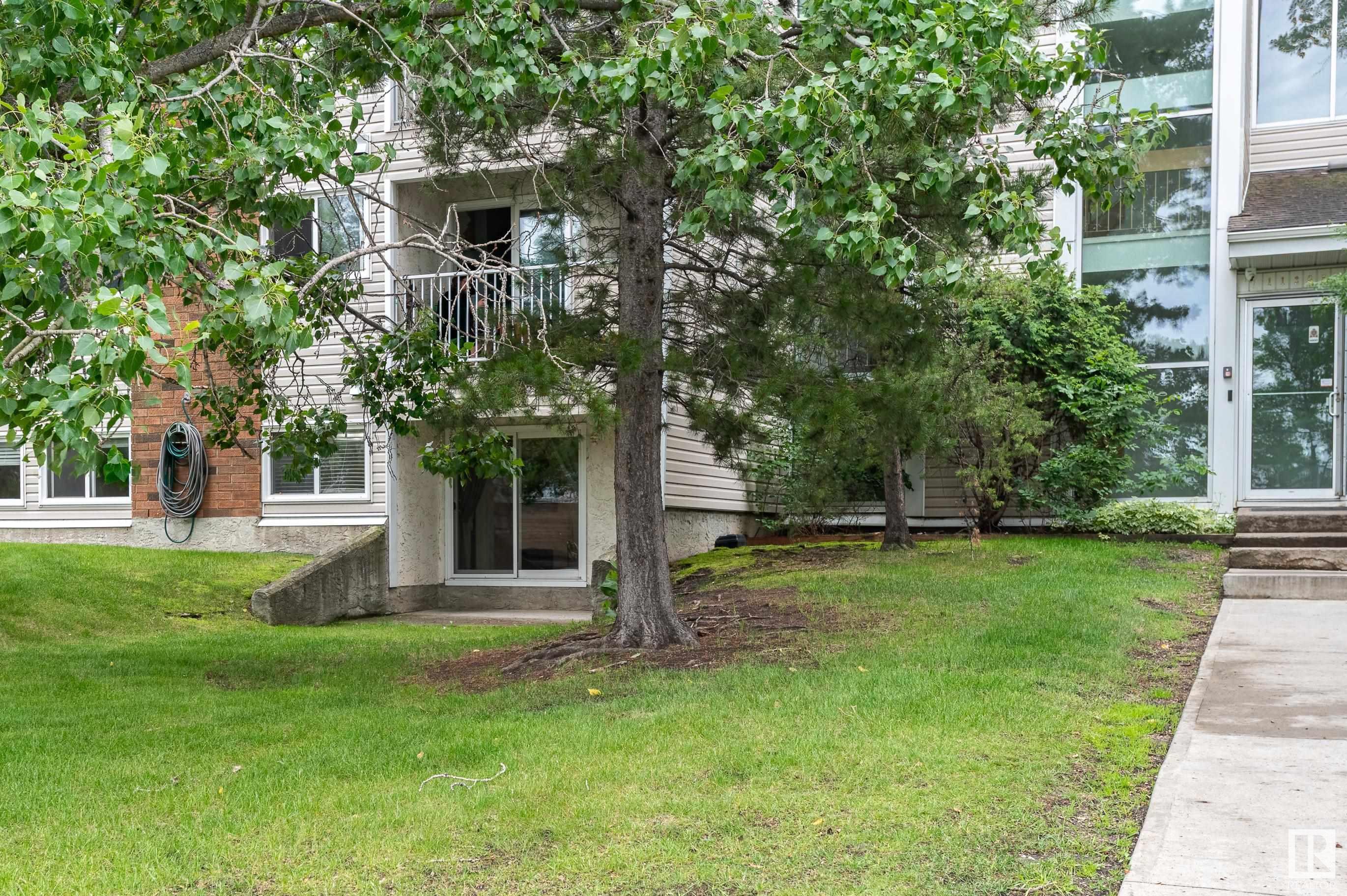 Property Photo: 11255 31 Avenue NW 8 AB T6J 3V6