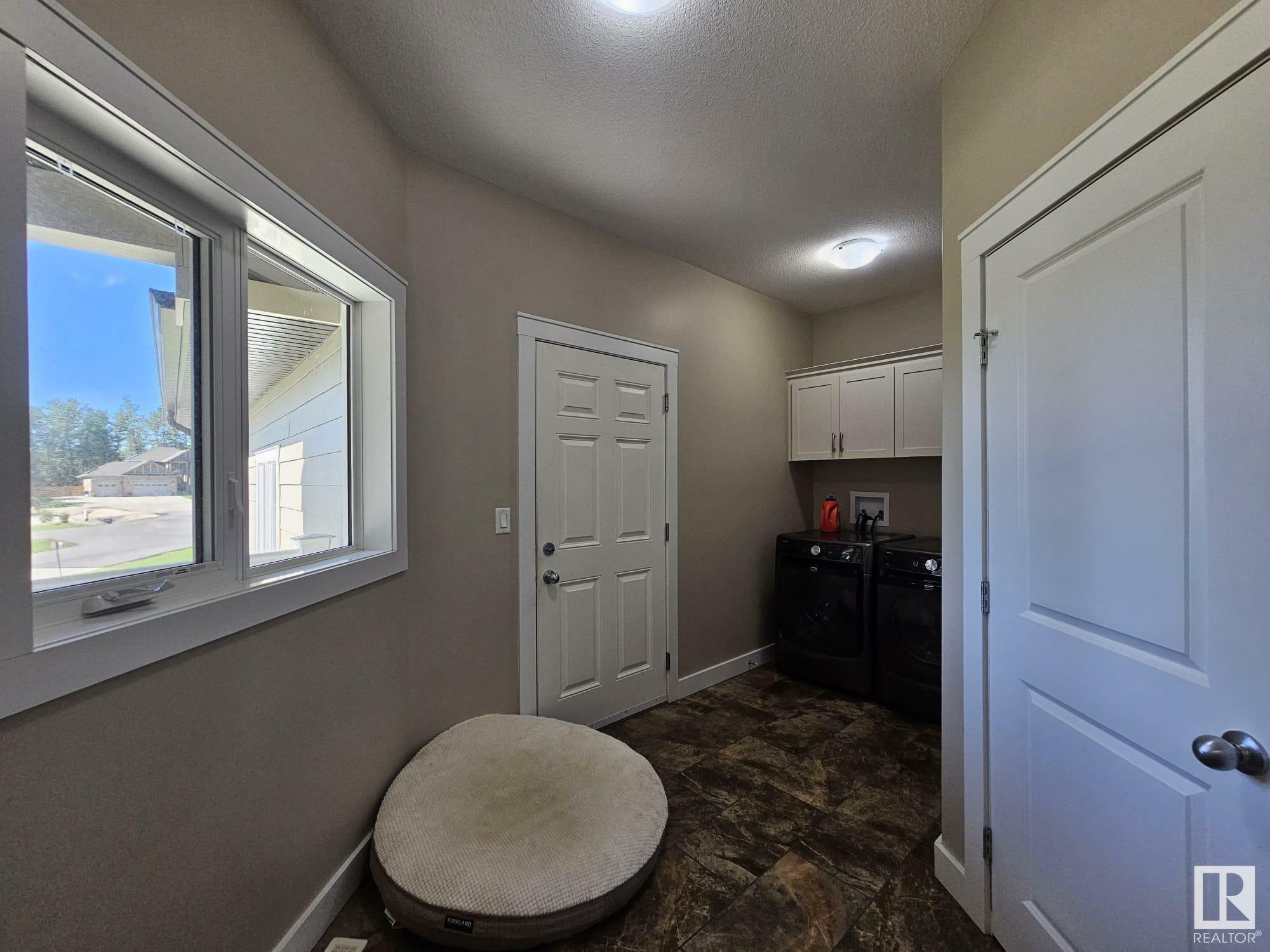 Property Photo: 109 49119 Range Road 73 AB T7A 2A2