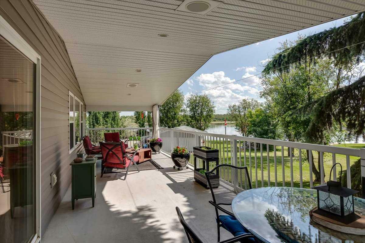 Property Photo: 36078 Range Road 245A 209 AB T0M 1R0