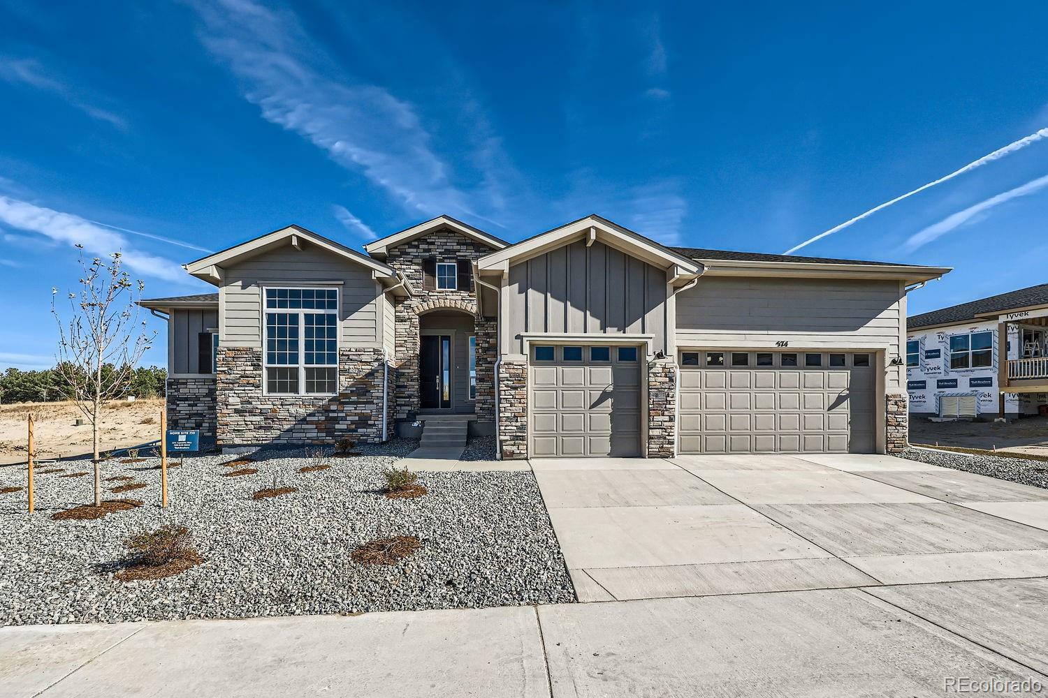 Property Photo: 574 Agoseris Way CO 80104