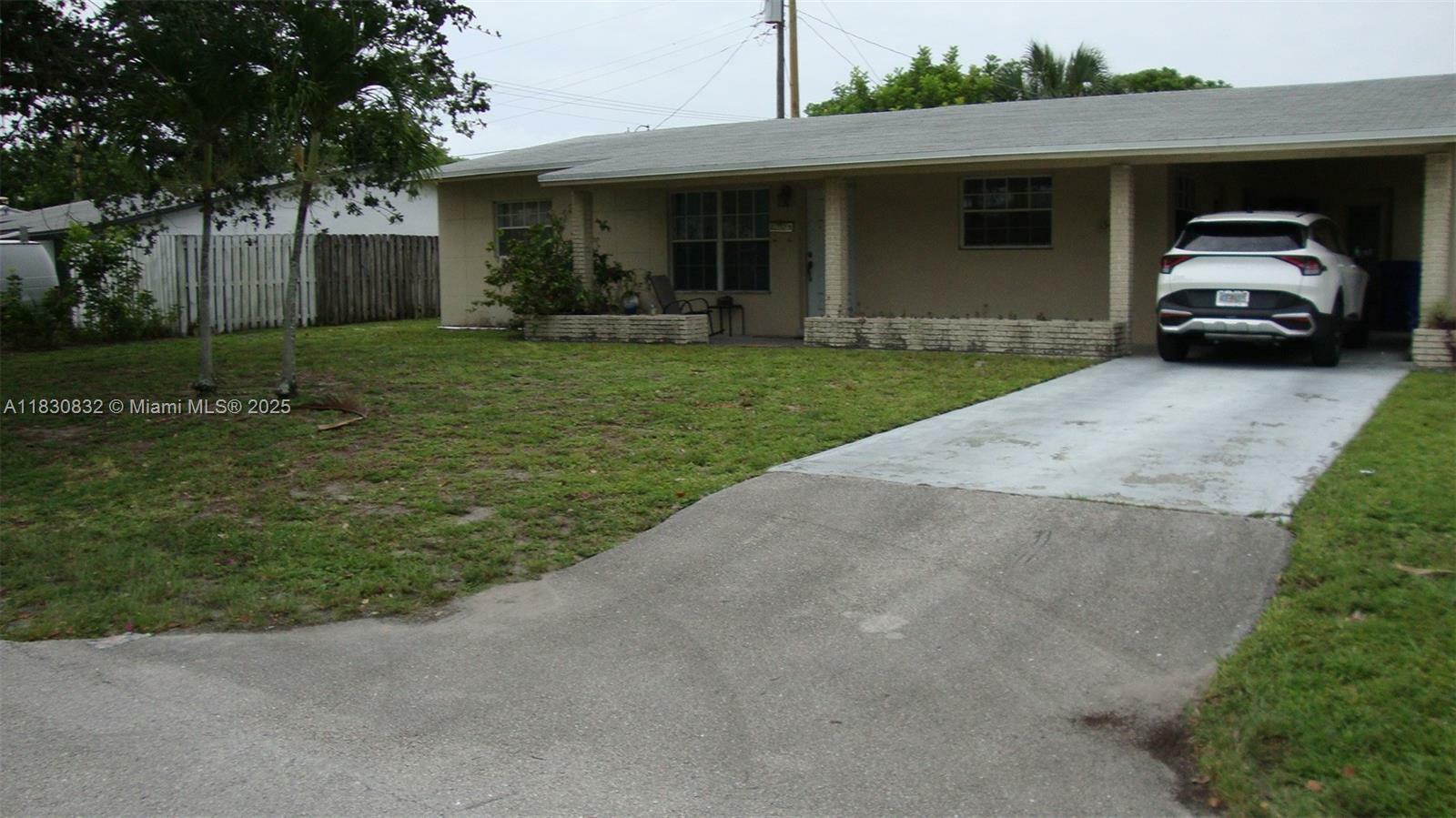 Property Photo: 1500 NE 33rd Ct FL 33064