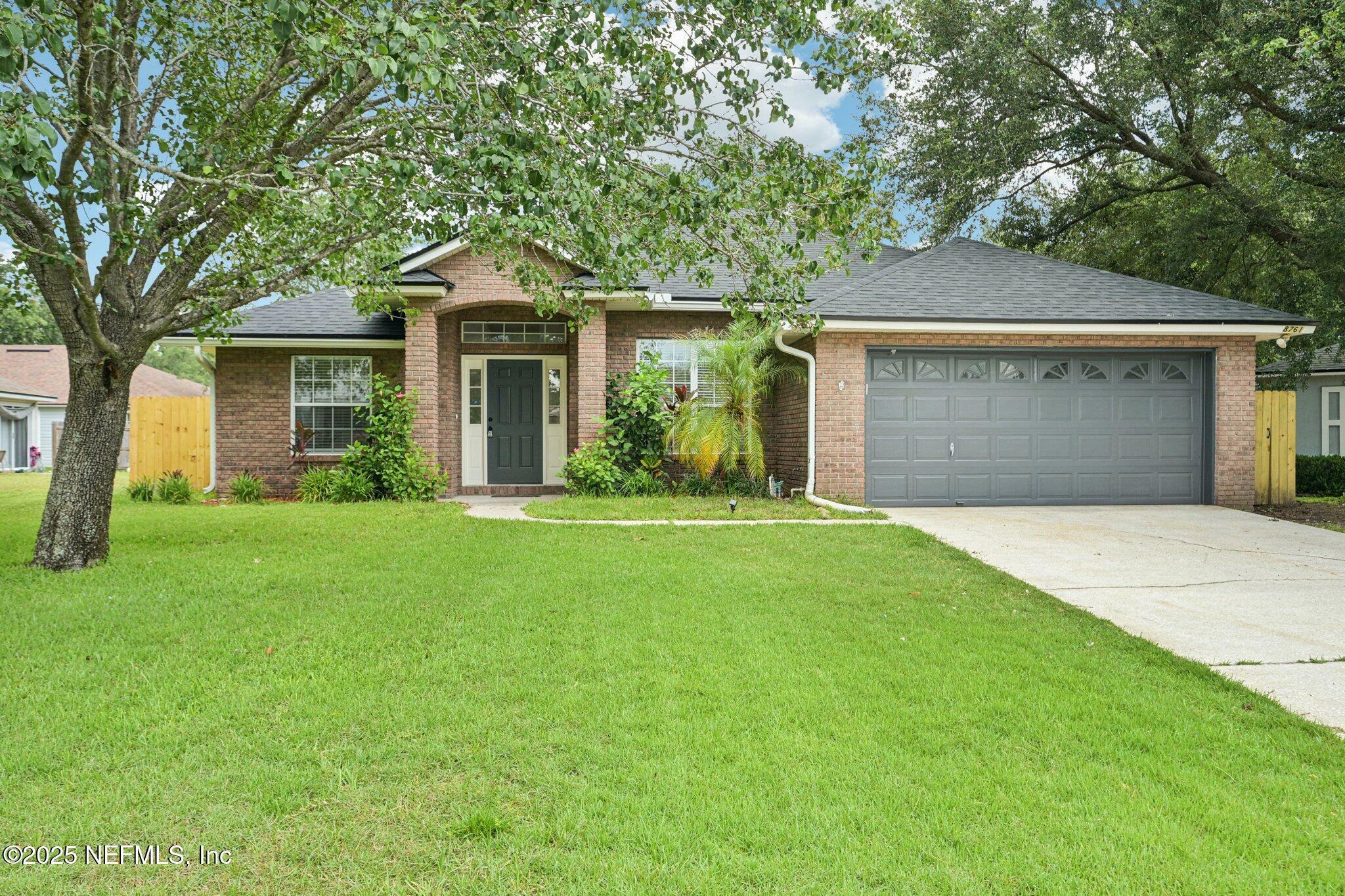 Property Photo: 8761 Redleaf Court FL 32244