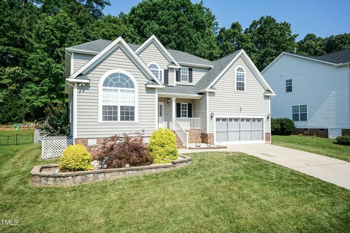 Property Photo:  212 Mickleson Ridge Drive  NC 27603 