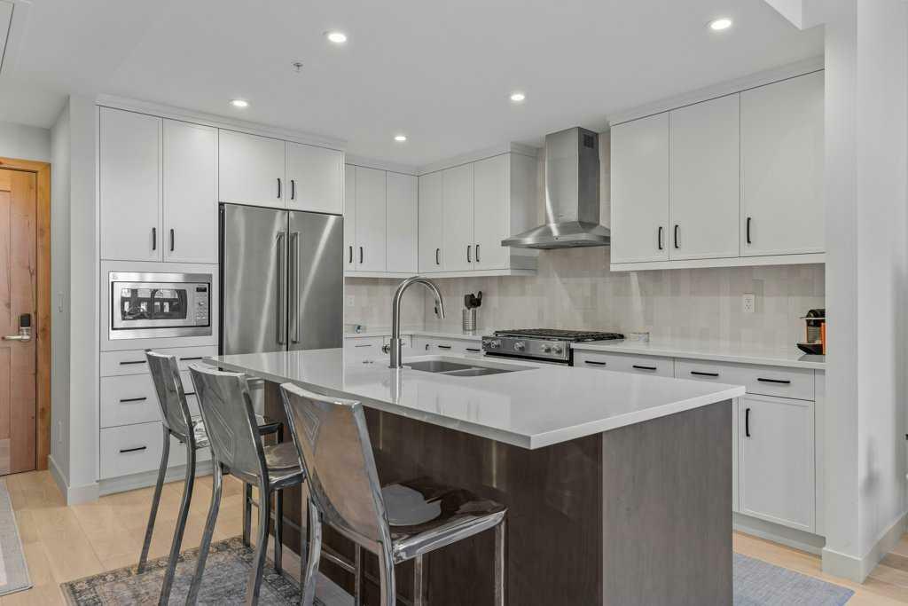 Property Photo: 1315 Spring Creek Gate 306 AB T1W 0N5