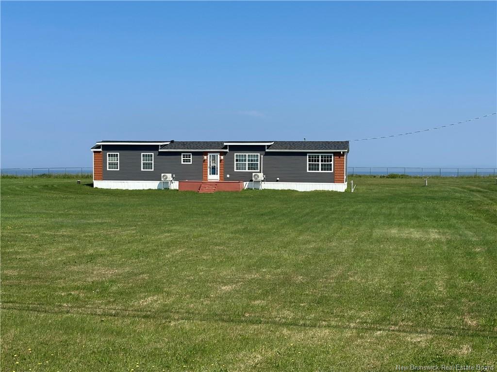 Property Photo:  493 Rue Acadie Street  NB E8N 1C6 