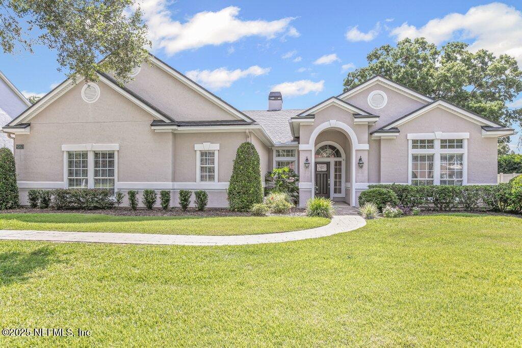 Property Photo: 205 N Checkerberry Way FL 32259