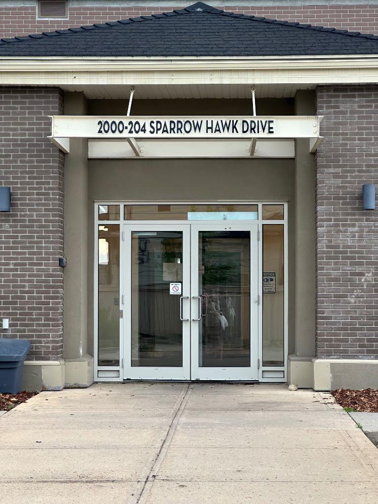 Property Photo: 204 Sparrow Hawk Drive 2218 AB T9K 0P1