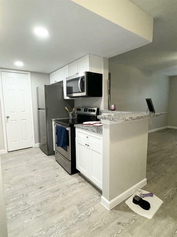 Property Photo: 327 W West Huffsmith Drive 404 TX 77375