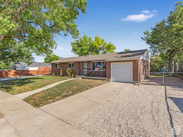 Property Photo: 7645 W Gardenia Ave UT 84044