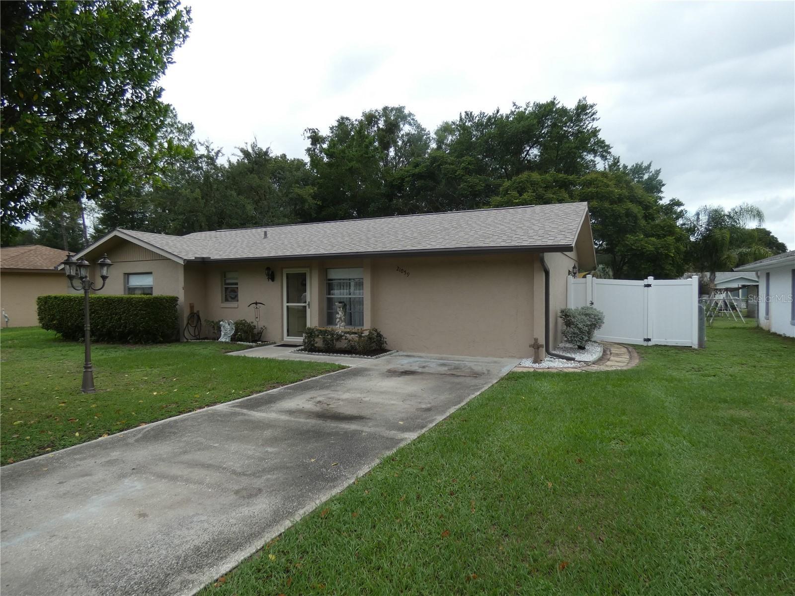 Property Photo: 21059 SW Raintree Street FL 34431