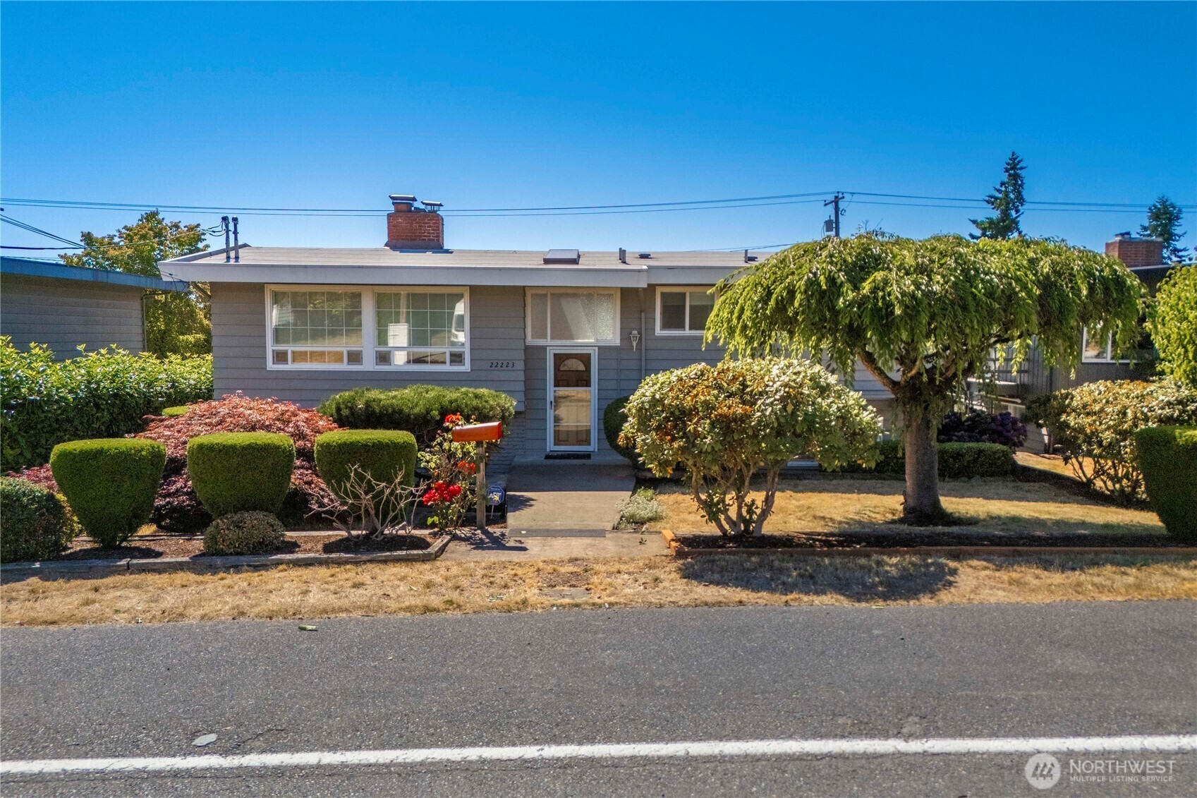 Property Photo:  22223  10th Avenue S  WA 98198 