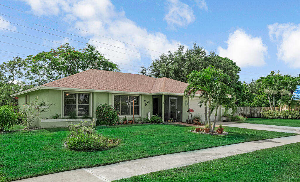 Property Photo: 1743 Shower Tree Way FL 33414